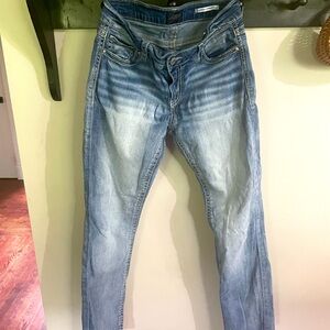 Women’s Buckle brand jeans.